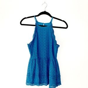 Embroidered eyelet blouse.